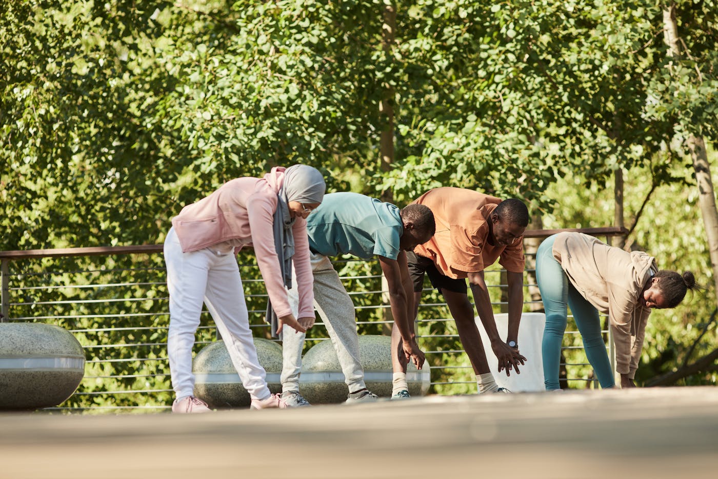 Person stretching outdoors as part of a healthy active lifestyle